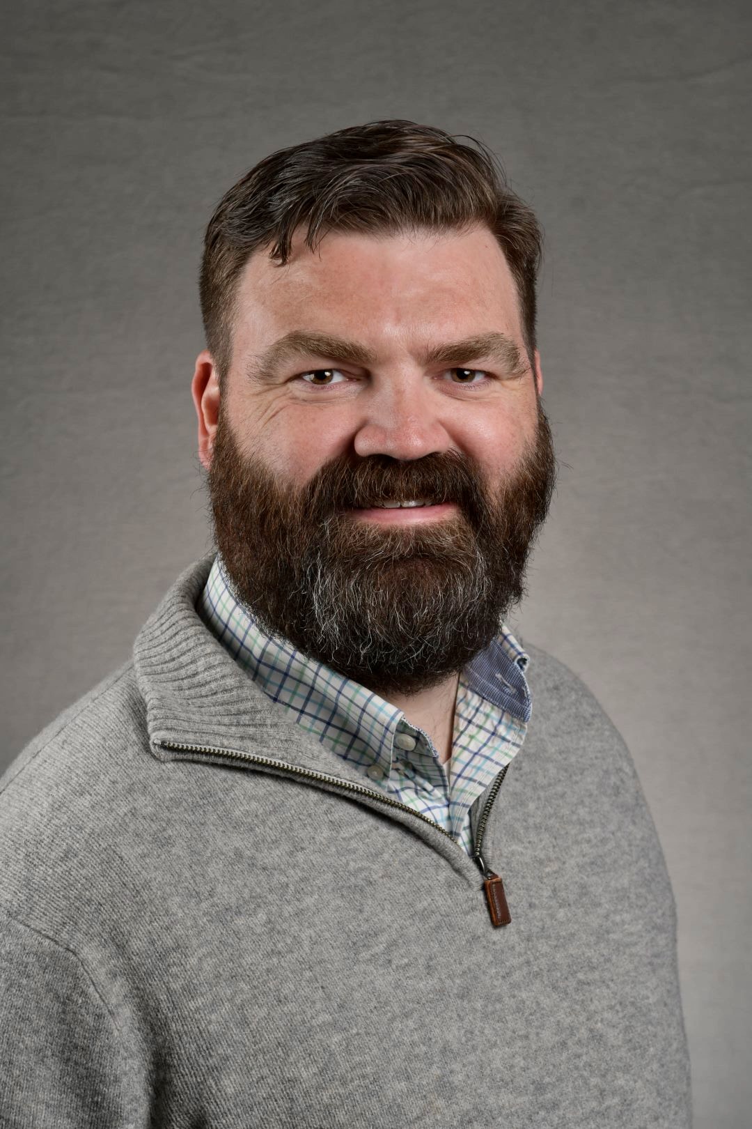 Professional headshot of Dylan Hayden
